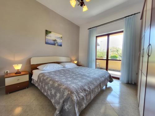 Postel nebo postele na pokoji v ubytování Cozy Apartment Mandula