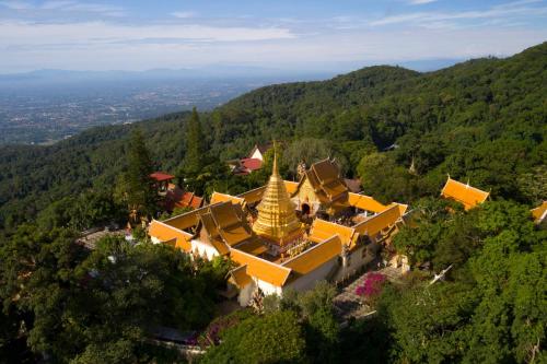 an aerial view of a building in the mountains at InterContinental Chiang Mai The Mae Ping in Chiang Mai