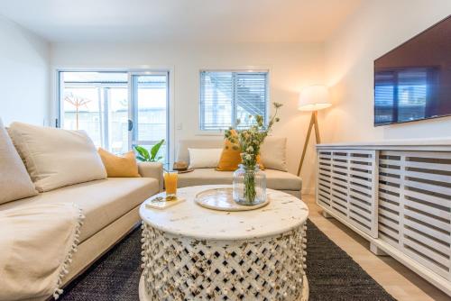 Posezení v ubytování Beachside Apartment at Palm - Coast & Country