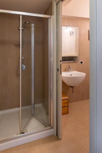 a bathroom with a shower and a sink at La Casa di Angelina - Pesaro Centro-Mare in Pesaro
