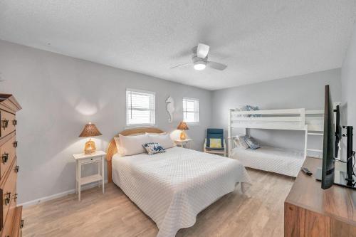 Katil atau katil-katil dalam bilik di Sea Shell Townhome 23