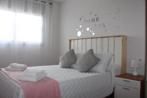 En eller flere senge i et værelse på El Racó de Yleth