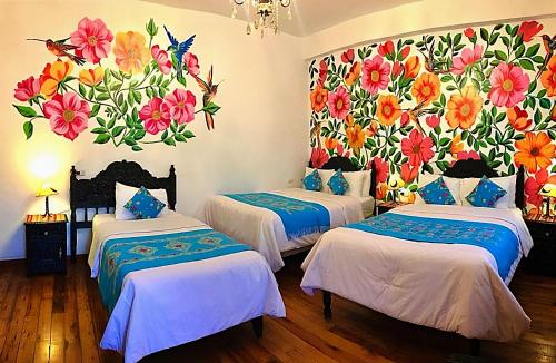 Postel nebo postele na pokoji v ubytování Casona Dorada Hotel Cusco