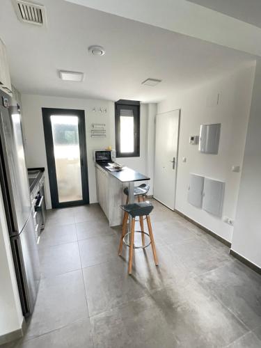 Kuchyň nebo kuchyňský kout v ubytování Apartamento Mar Jonica
