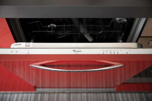 a close up of a microwave oven with its door open at [Strategico Rho Fiera-Milano] Vanzago Home Deluxe in Vanzago