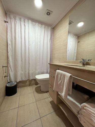 חדר רחצה ב-Apart Hotel Aragon Portal