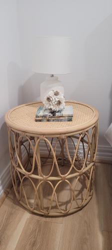 a coffee table with a cake on top of it at Boutique Beach House in the HEART of St. Kilda in Melbourne
