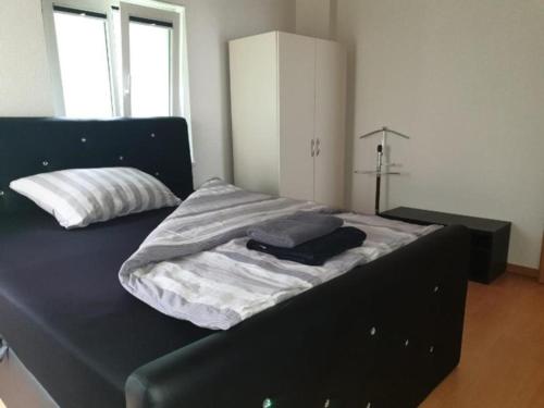En eller flere senger på et rom på 3 Doppelzimmer Ferienwohnung in Arbon am Bodensee