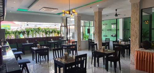 Een restaurant of ander eetgelegenheid bij Siem Reap Urban Boutique Hotel