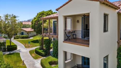 a view of a house with a balcony at LV025 Airy Upstairs Studio with Mountain Views in La Quinta