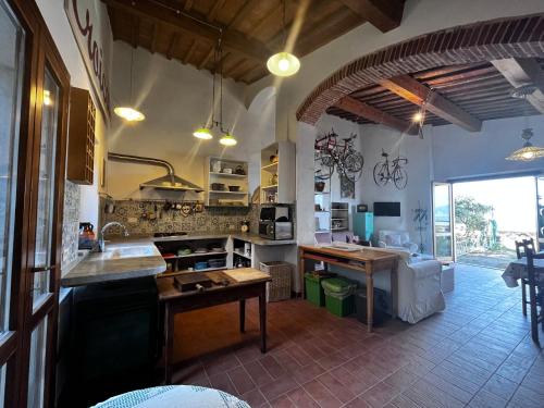 a kitchen with a sink and a counter top at Eroico sul Mare in Portoferraio