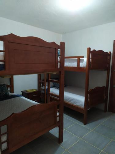 EN BAÑOS, HERMOSO y ACOGEDOR DEPARTAMENTO UBICADO EN PLENO CENTRO DE LA CIUDADにあるベッド