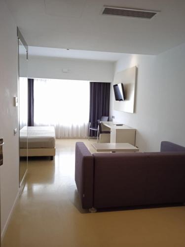 Cama o camas de una habitación en Hotel Poseidon
