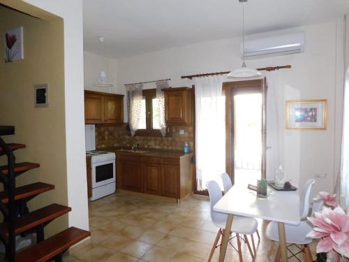 Kuchyň nebo kuchyňský kout v ubytování Villa Dima