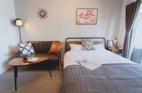 Ένα ή περισσότερα κρεβάτια σε δωμάτιο στο 川HOUSE黒門