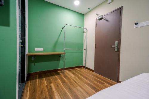 Postel nebo postele na pokoji v ubytování 3C HOTEL Setia Walk Puchong