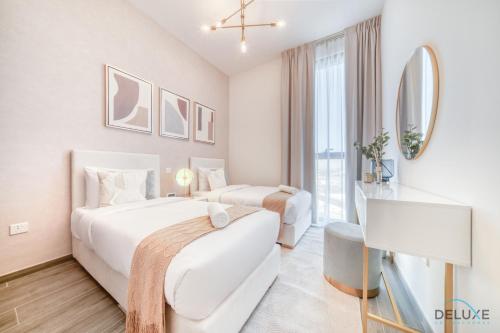 Postel nebo postele na pokoji v ubytování Exquisite 2BR with Assistant Room at Mesk 1 Midtown Dubai Production City by Deluxe Holiday Homes