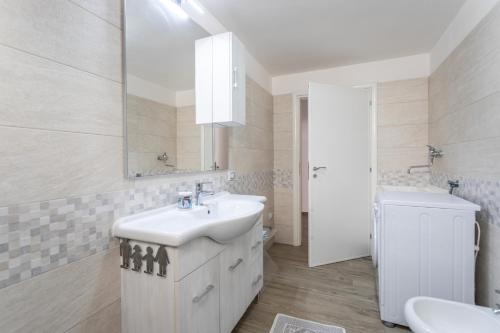 Koupelna v ubytování Appartamento Potenza 50 mt mare - Apulia Home