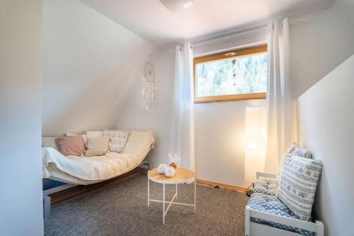 A seating area at Butterfly Cottage by the Creek