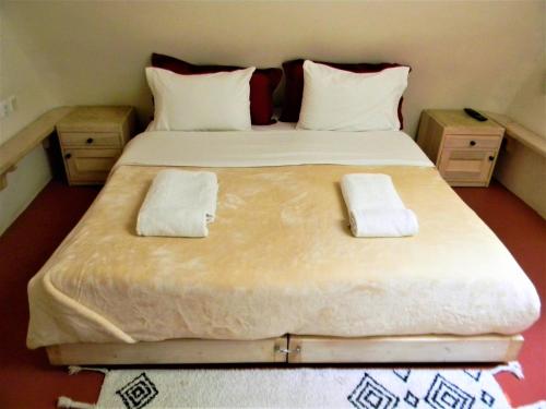 Postel nebo postele na pokoji v ubytování Villa Kisiris