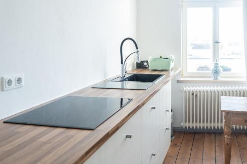 Kuchyň nebo kuchyňský kout v ubytování Gasthaus Lammkontor