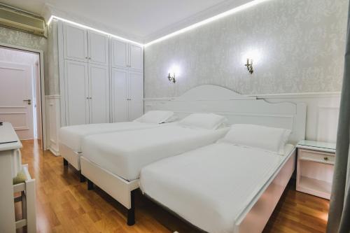 Porto Eda Hotelにあるベッド