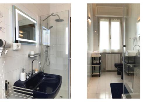 een badkamer met een zwarte wastafel en een spiegel bij Appartamento 2, Villa Magnolia, 64mq, Lago di Garda in Peschiera del Garda