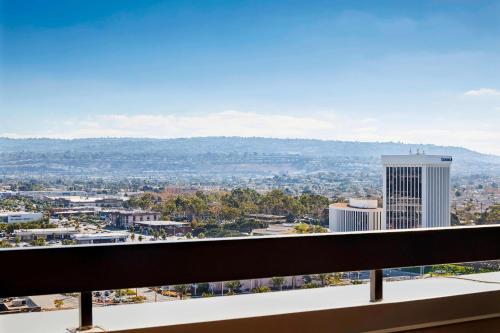 a view of the city from the balcony of a building at Torrance Marriott Redondo Beach in Torrance