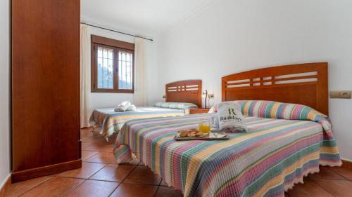 Postel nebo postele na pokoji v ubytování La Villa Pozuelas Iznájar by Ruralidays