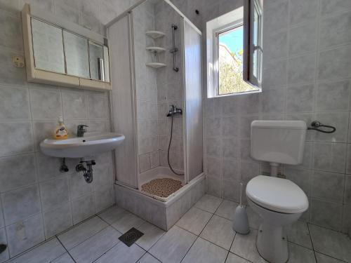 Koupelna v ubytování Apartments HARMONY Novalja