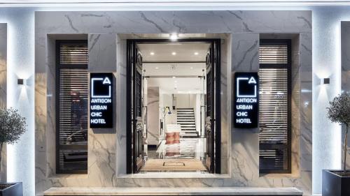 a store front with a mirror in front of it at Antigon Urban Chic Hotel, Thessaloniki in Thessaloniki