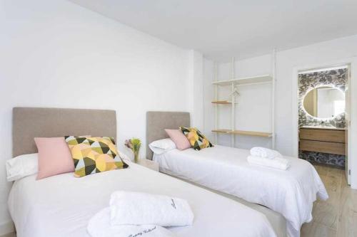Ένα ή περισσότερα κρεβάτια σε δωμάτιο στο Sunnyland apartment arona