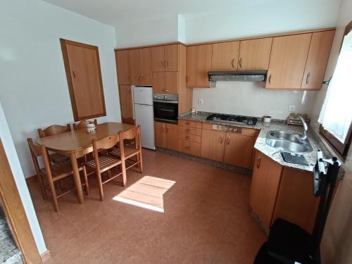 Kuchyň nebo kuchyňský kout v ubytování Casa Antiuxía