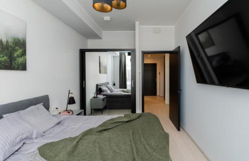 Postel nebo postele na pokoji v ubytování Pärnu Verde Apartments