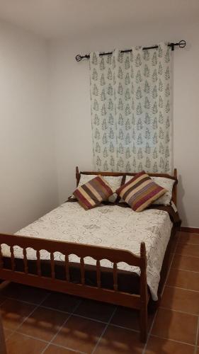 Katil atau katil-katil dalam bilik di Chalet Villa Caulina