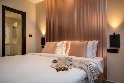 Кровать или кровати в номере Sahara Hotel Eilat