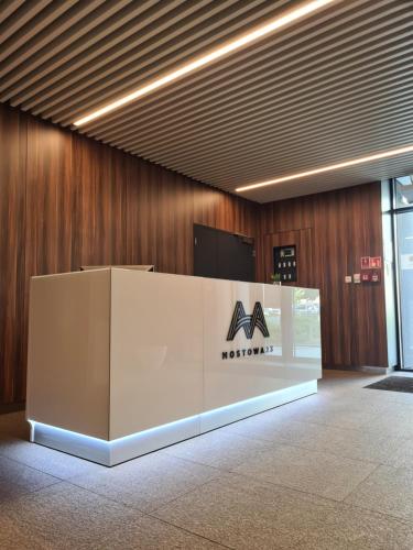 a museum exhibit with a nordstrom sign in a building at Mostowa 23 HUGO Apartment, self check-in 24h, free parking, air-conditioning in Poznań