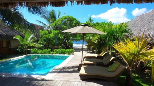 Bazén v ubytování Green Lodge Moorea nebo v jeho okolí