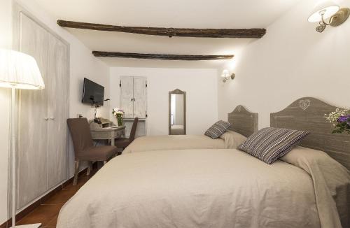 B&B I Tre Caminiにあるベッド