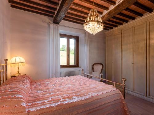 Ένα ή περισσότερα κρεβάτια σε δωμάτιο στο Holiday Home Alighiero II by Interhome