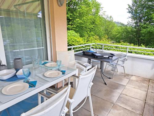 a patio with a table and chairs on a balcony at Apartment Vinzek by Interhome in Töschling