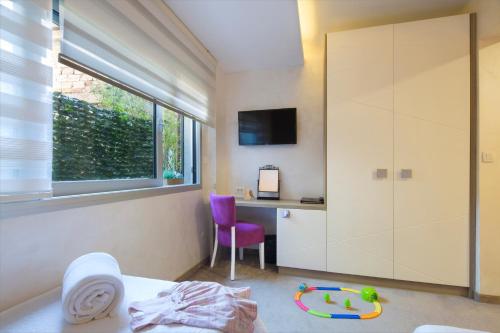 TV a/nebo společenská místnost v ubytování Hotel Hermes Budva
