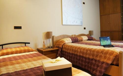 Una cama o camas en una habitación de B&B Stephany