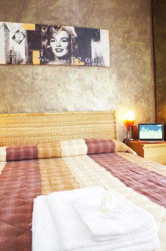 Una cama o camas en una habitación de B&B Stephany