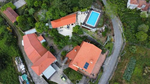 an overhead view of a house with orange roofs at Casa de Santa Luzia B in Caminha