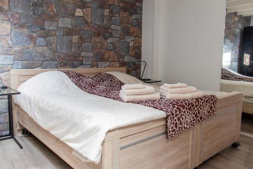 Bed and Breakfast Harvey suite tesisinde bir odada yatak veya yataklar