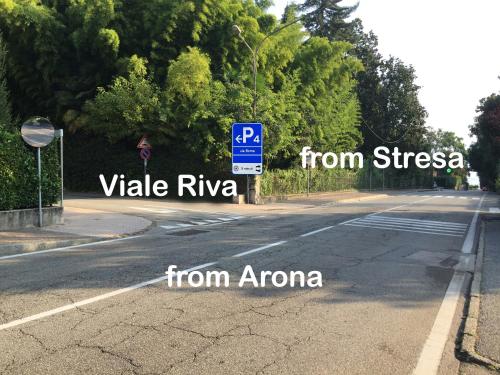 a road with street signs on the side of the road at L'Antico Borgo in Lesa