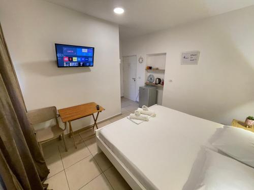 Postel nebo postele na pokoji v ubytování Anel Studios