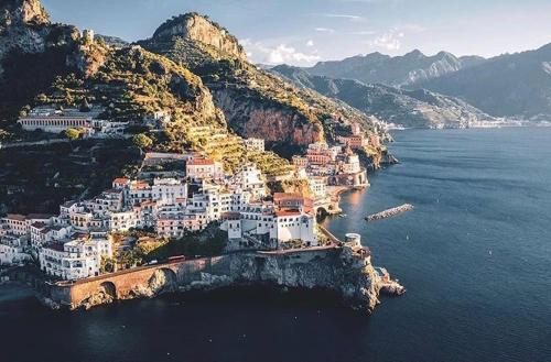 an aerial view of a village on a mountain at FRENNESIA Amalfi Coast in Atrani