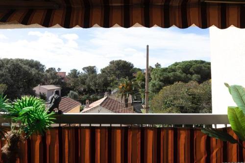 a view of a city from a balcony at Appartement climatisé design au cœur de St-Aygulf à 200 metres la mer in Saint-Aygulf